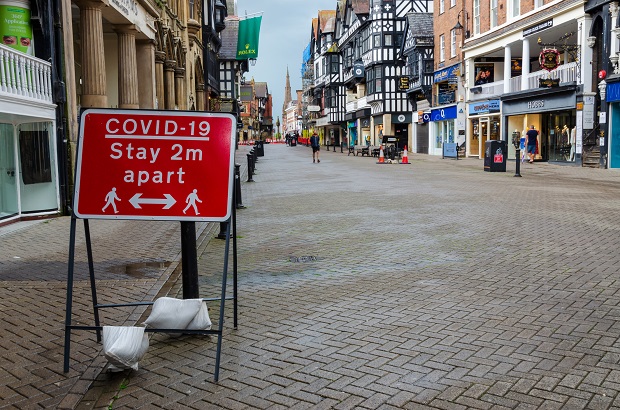 Chester, UK: Jun 14, 2020: A general street scene of Chester City centre showing some traffic & pedestrian restrictions which have been put in place to allow social distancing due to Covid-19 pandemic
