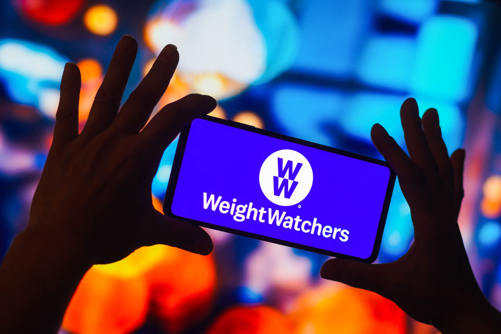In this photo illustration, the Weight Watchers (WW