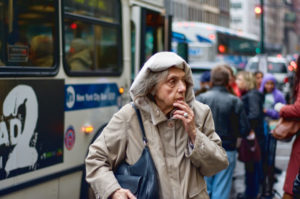 Elderly woman in the city