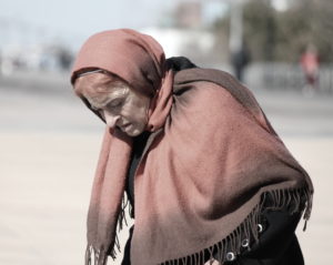 Elderly woman wearing a shawl 